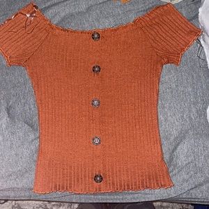 Dark orange shirt, never worn, size small